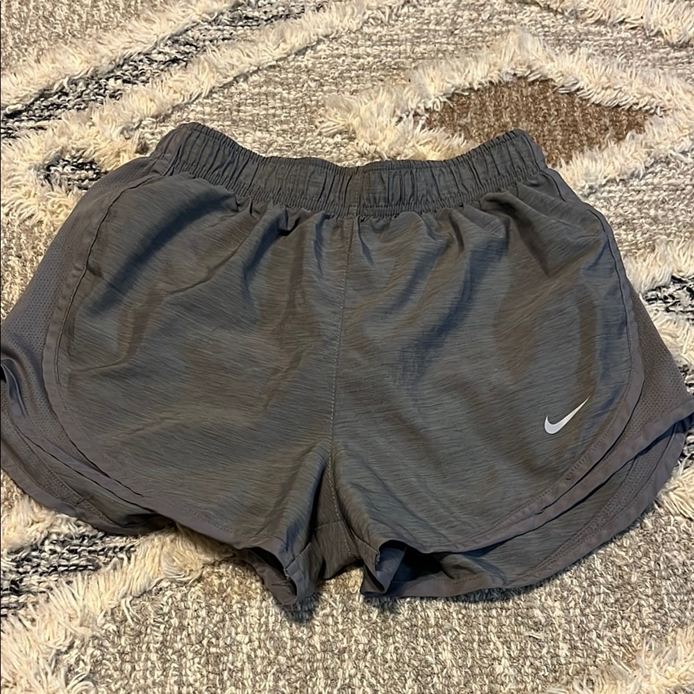 Nike Gray Athletic Shorts with Elastic Waistband and Dolphin Hem